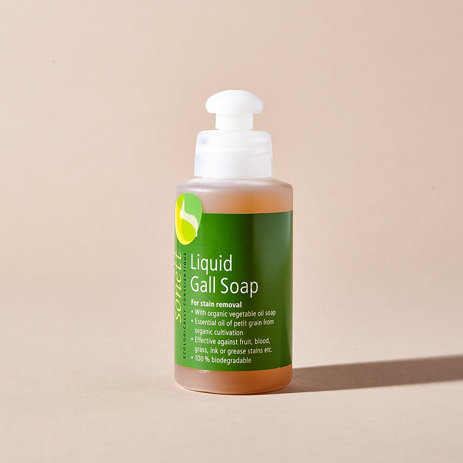 A bottle of Sonett liquid gall soap for stain removal with a green label