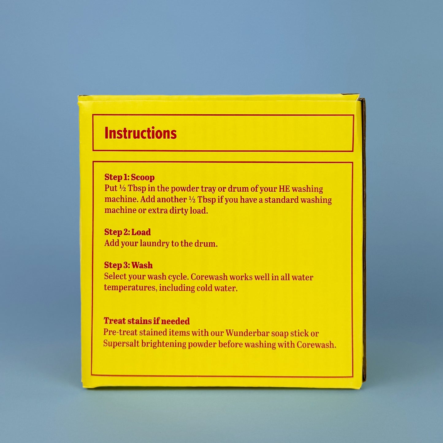 Corewash laundry powder by Celsious in yellow packaging with red label, instructions panel