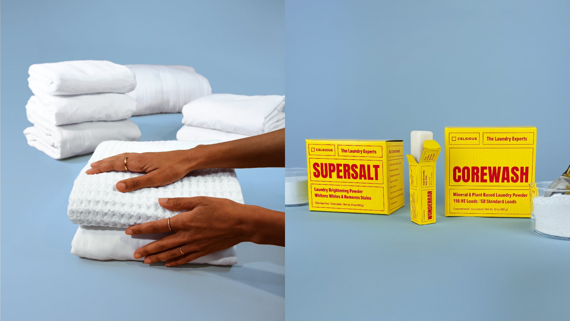 Hands rest on neatly folded white linens - pictured with Celsious laundry products