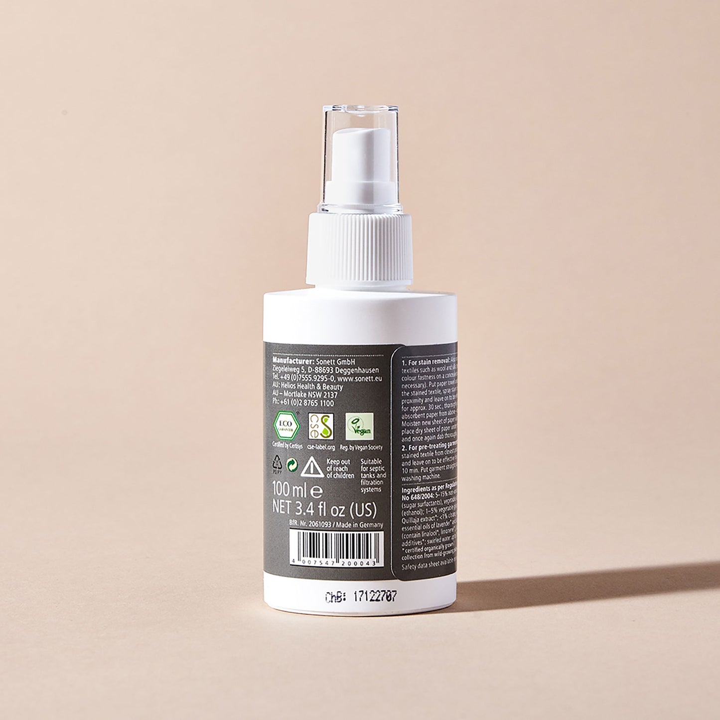 The back of a spray bottle of Sonett eco-friendly stain removal spray showing instructions and certifications