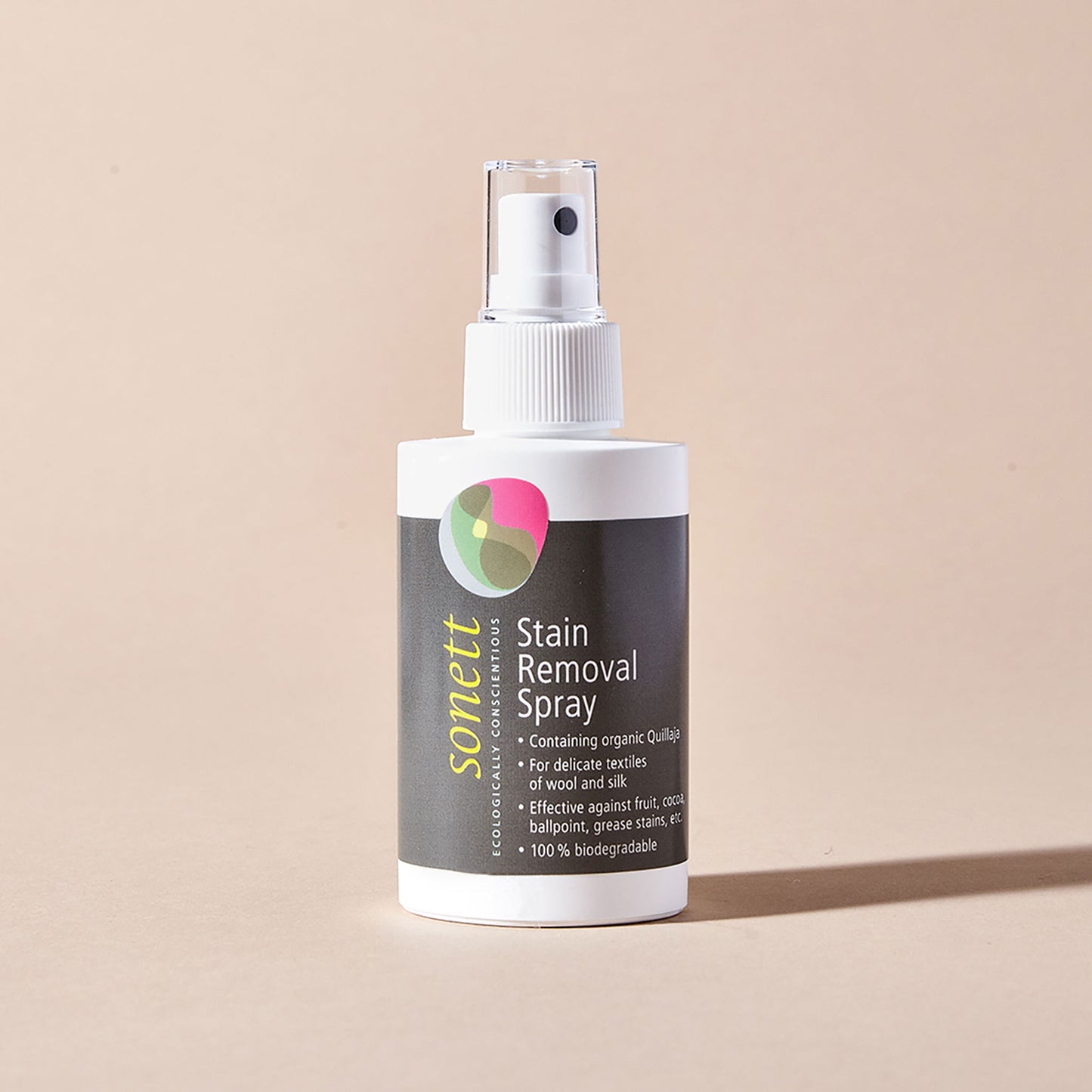 A white spray bottle of Sonett eco-friendly stain removal spray with a grey label