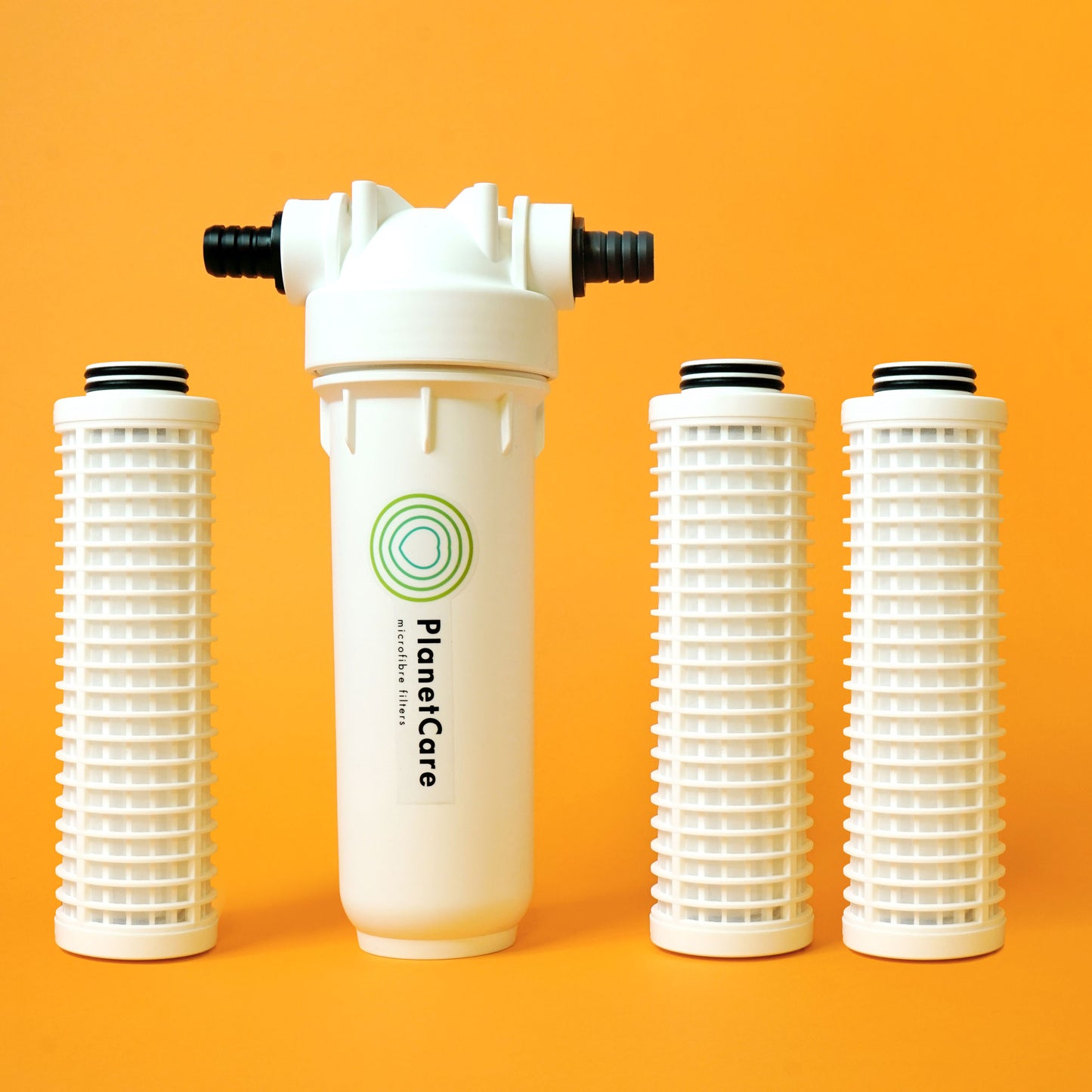 The PlanetCare microfiber filter housing and three cartridges