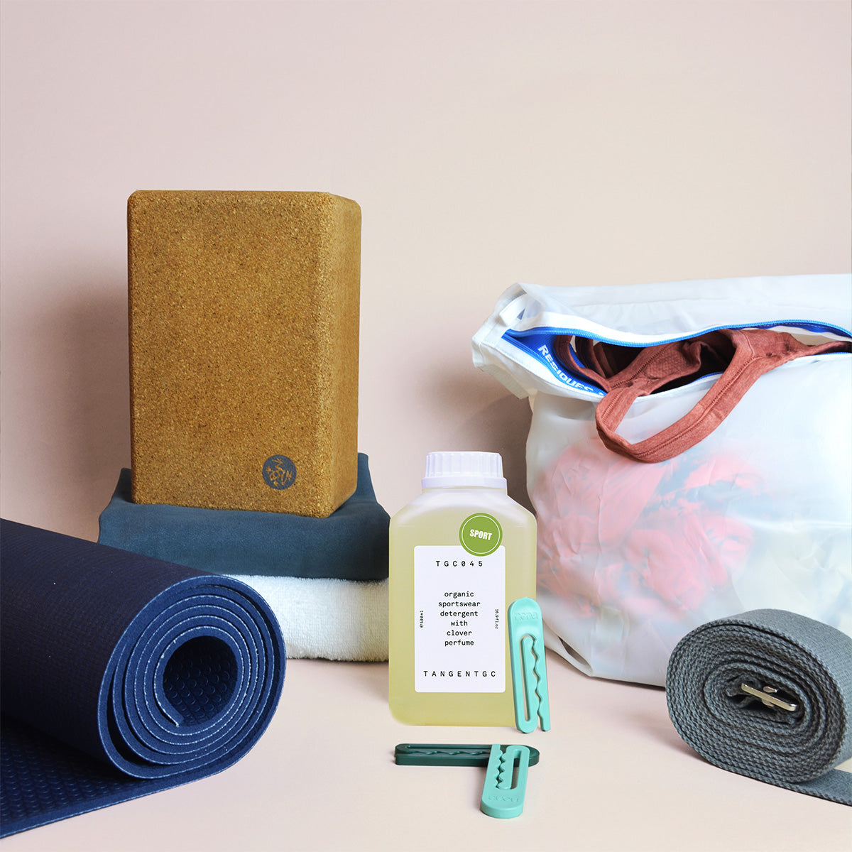 An assortment of yoga equipment and eco-friendly laundry products