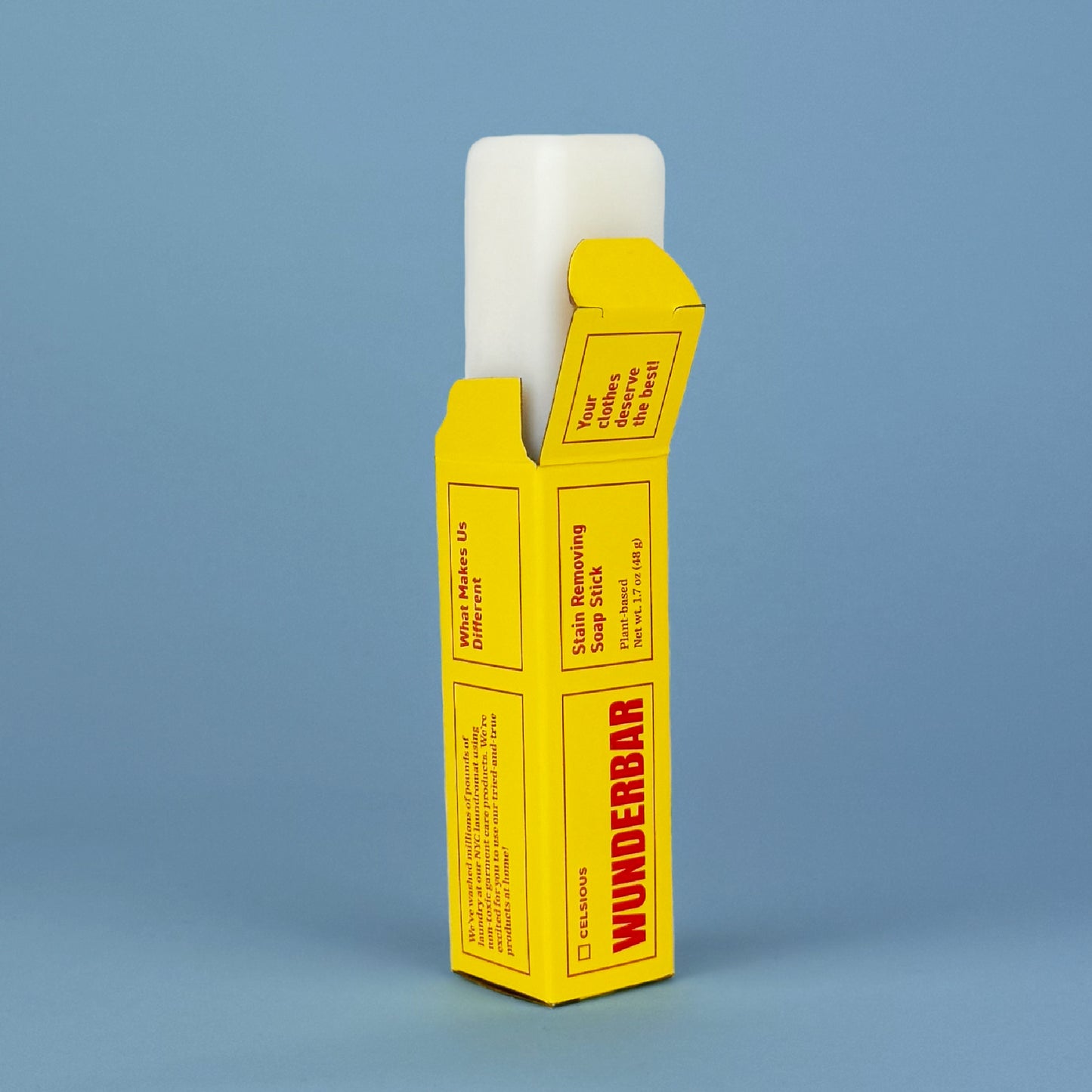 Wunderbar stain stick peeking out of yellow packaging with red font