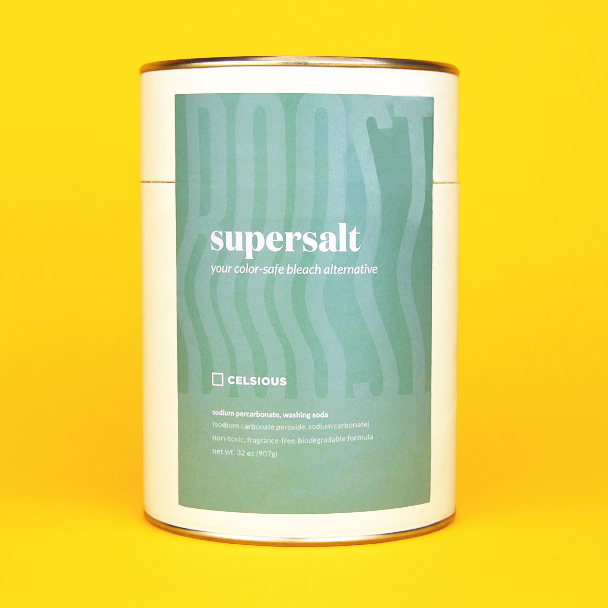 A white canister of Supersalt oxygen booster with a seafoam green label, photographed on a yellow backdrop