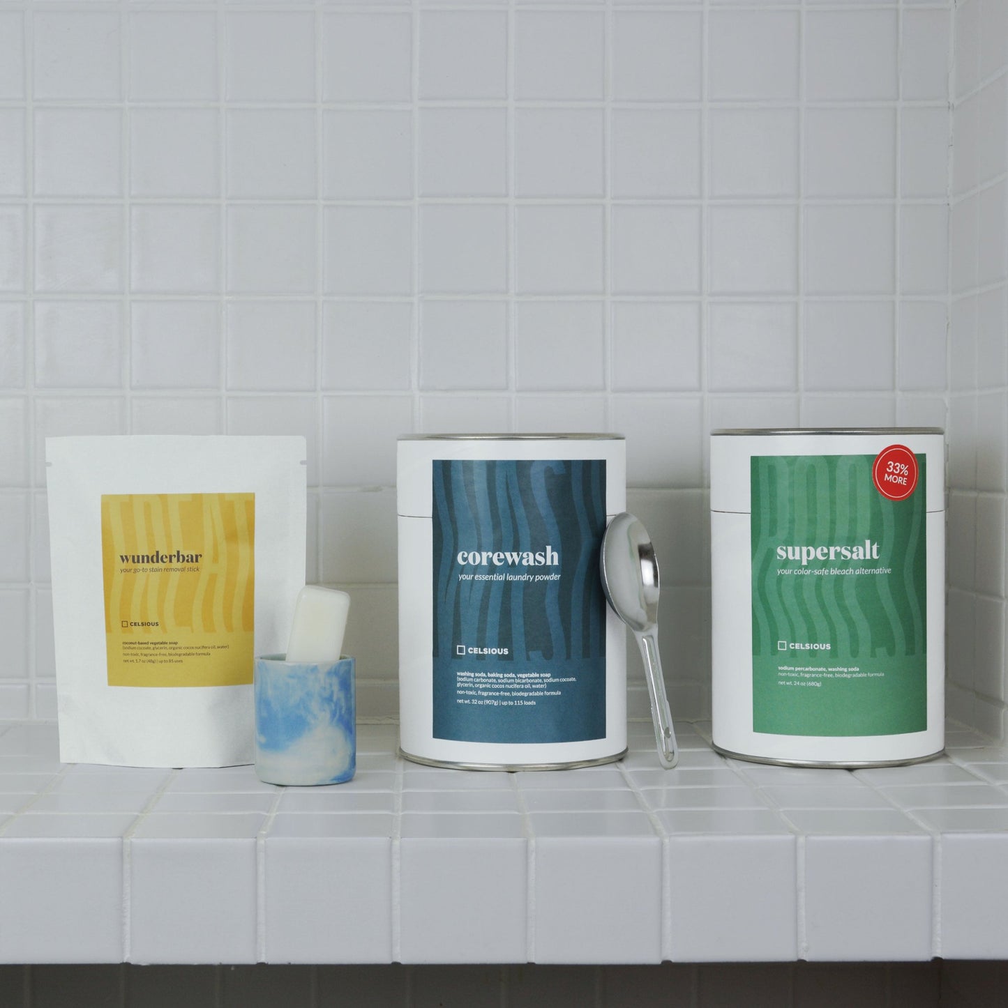 Celsious sustainable laundry products with a white tile background