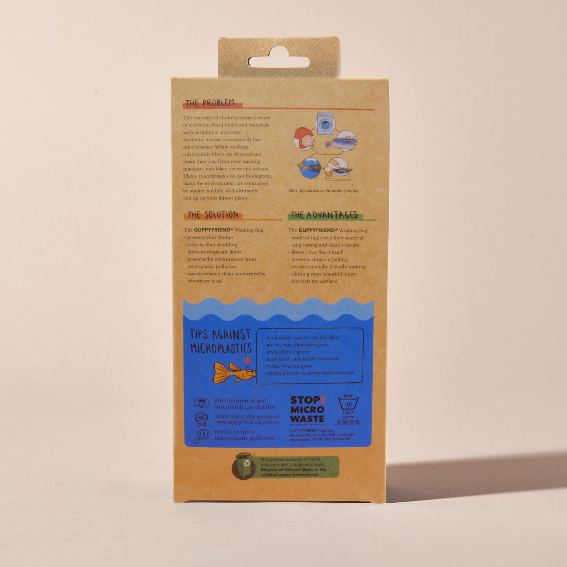 The back of Guppyfriend packaging, which outlines the microfiber pollution problem and the advantages of using a microfiber washing bag to reduce ocean plastic pollution