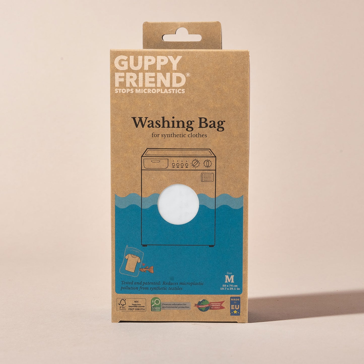The front of Guppyfriend microfiber wash bag packaging—the design incorporates a washing machine and the sea
